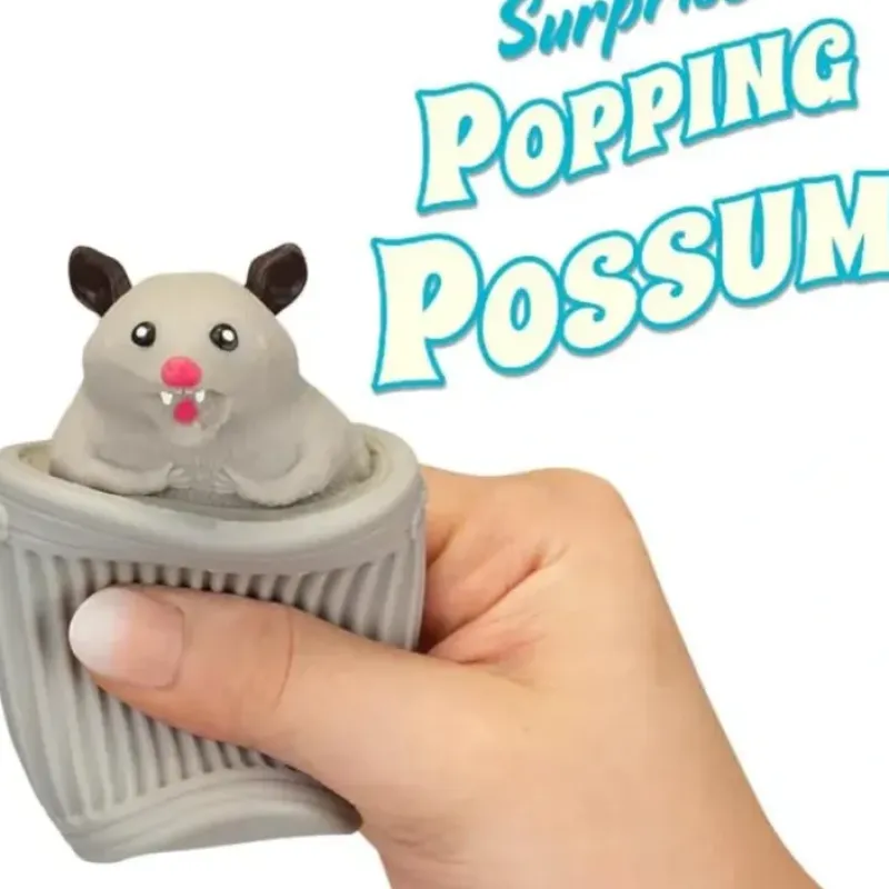 Egpull<Surprise Popping Possum in Trash Can - Squeeze it, SURPRISE! - Archie McPhee - Miniature Marvels: Airplane Models & Painted Dice
