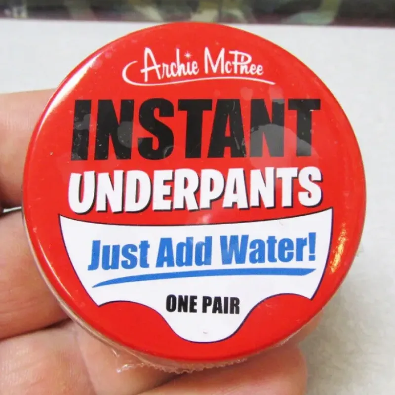 Egpull<UH OH... Instant Underpants in Tin - Just add water! Gag Joke ~ Archie McPhee - Miniature Marvels: Airplane Models & Painted Dice